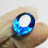 A certified natural light blue sapphire gemstone, 17.70 carats, in an oval cut, displayed as a loose stone.