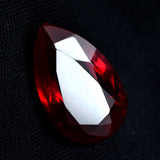 Authentic Red Ruby Pear Cut Gemstone 17.25 Ct on Black Background Natural and Certified