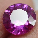 Single Pink Round Ruby Held Between Fingers Natural 8x8 mm Untreated Certified Gemstone