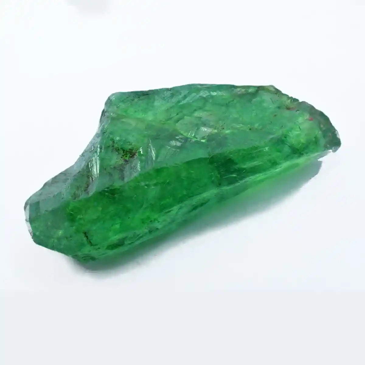Green crystal on a white background