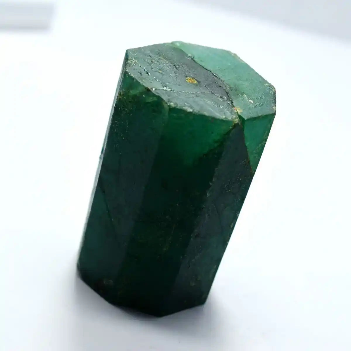 Green crystal on a white background