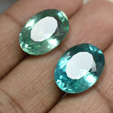 Green oval cut Montana sapphire pair, natural, 16.56 ct, certified.