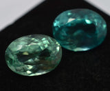 Certified loose gemstone pair – 16.56 ct green oval cut natural Montana sapphire.
