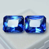 High-quality certified blue Ceylon sapphire pair, natural emerald cut, total weight 14.95 carats.