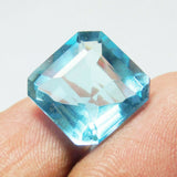 Blue Aquamarine Square Gemstone 8 Ct Held Between Fingers Eye Clean Quality