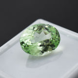 Certified loose gemstone – 5.20 ct natural grandidierite, oval cut, bluish-green.

