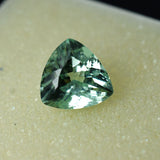 Natural bluish-green grandidierite, 3.60 ct trillion shape, certified.