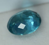 High-quality certified natural grandidierite, 8.12 ct bluish-green oval shape.