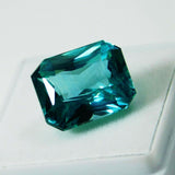 12.56 carat bluish-green emerald cut grandidierite, certified natural gemstone