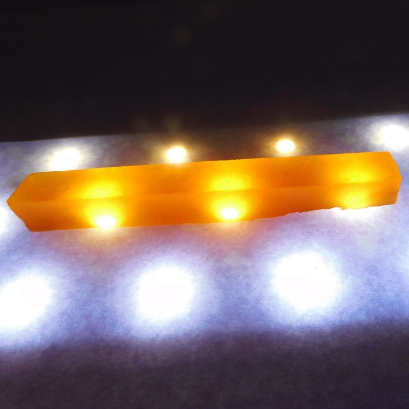 Natural Uncut Rough Yellow Sapphire 66.75 Ct - close-up showing natural inclusions