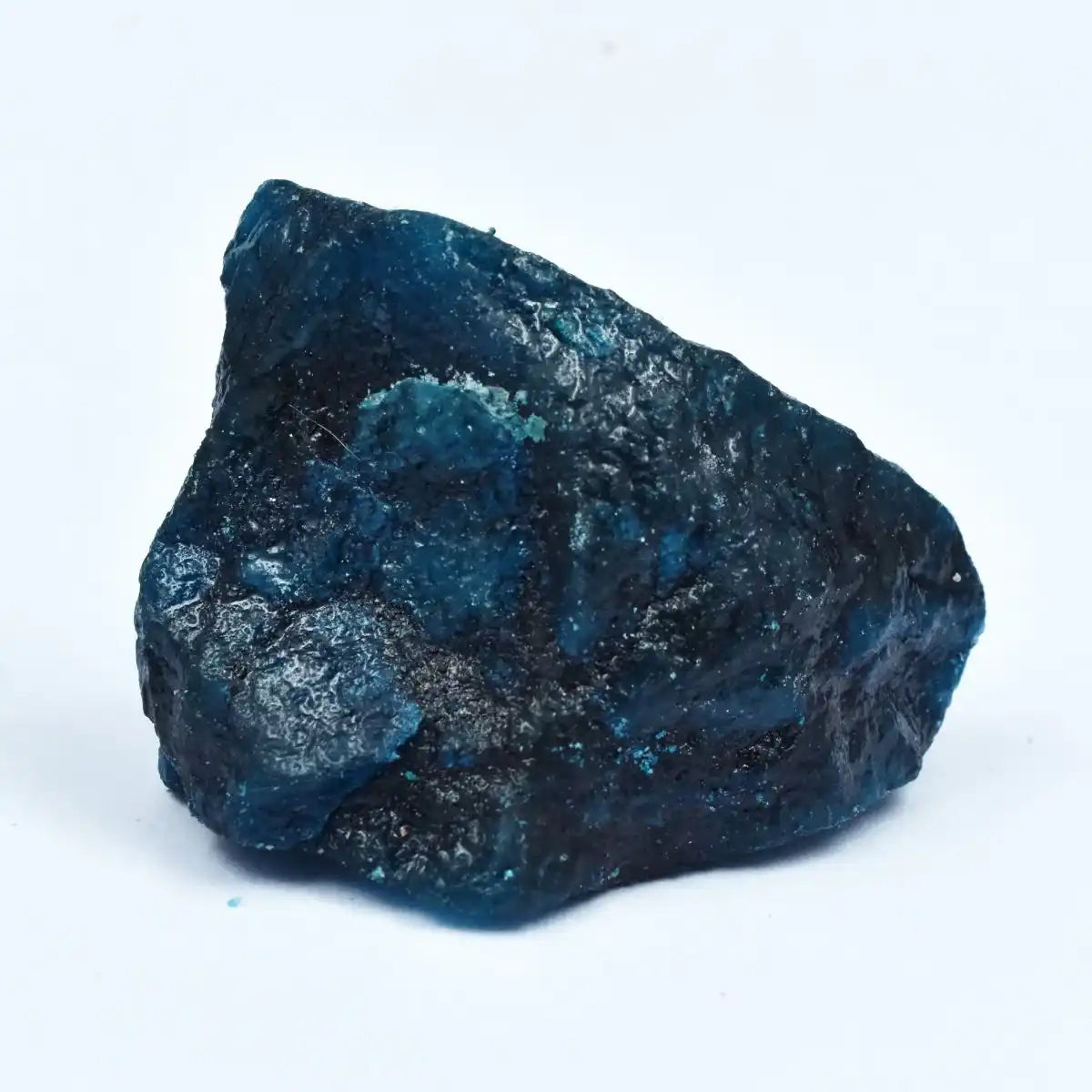 Blue mineral rock on a white background