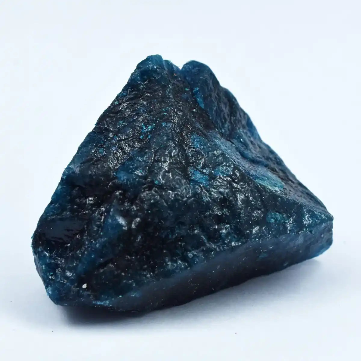 Blue mineral rock on a white background