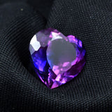 Eye Clean Purple Tanzanite Heart Cut Gemstone 9.10 Ct on Black Background