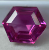 Eye-clean fancy cut pink ruby placed on clean white background – 11.33 carat certified gemstone
