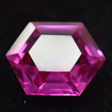 Translucent fancy shape ruby gemstone with deep pink hue on black background – 11.33 Ct