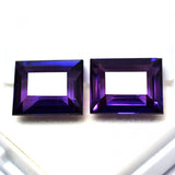 18.54 Ct Natural Purple Tanzanite Emerald Cut Gemstone Displayed Between Fingers