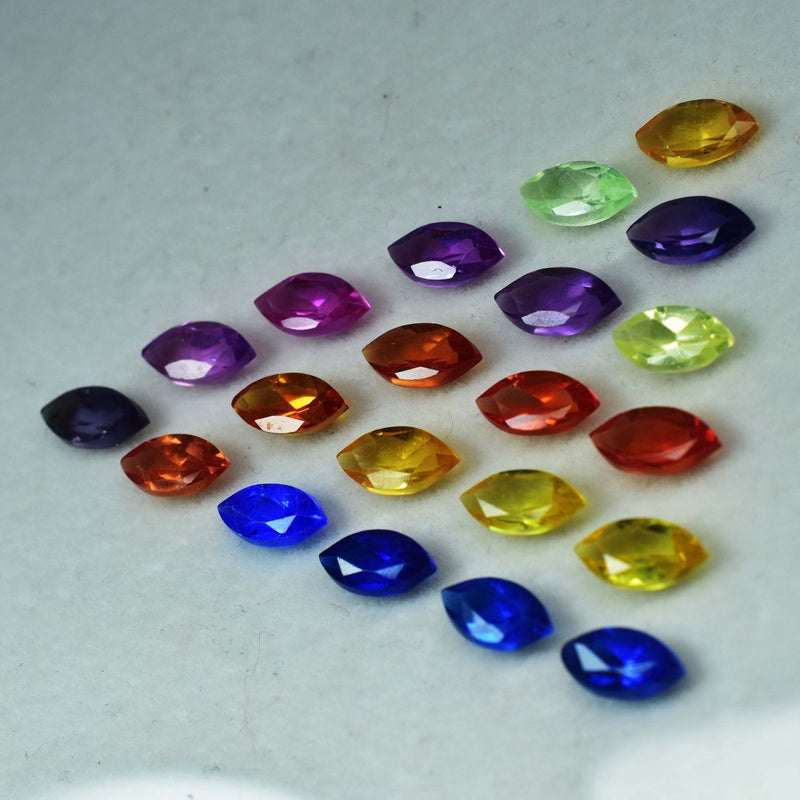 Untreated Sapphire Marquise Cut 10x5 mm loose sapphires under studio light