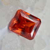 Loose gemstone certified 3.05 ct emerald cut Padparadscha sapphire
