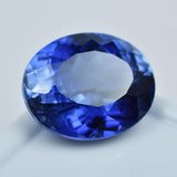 15.90 Ct Certified Oval Cut Blue Tanzanite Loose Gemstone on White Background – Lab-Created