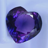 Certified Perfect Heart Cut Purple Tanzanite 8.35 Carat Gemstone on White Surface – Eye Clean