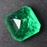 Backside view of natural Colombian emerald with 8.6 mm depth, revealing craftsmanship and base clarity