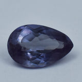 Certified Alexandrite gemstone in pear shape displayed on clean white background