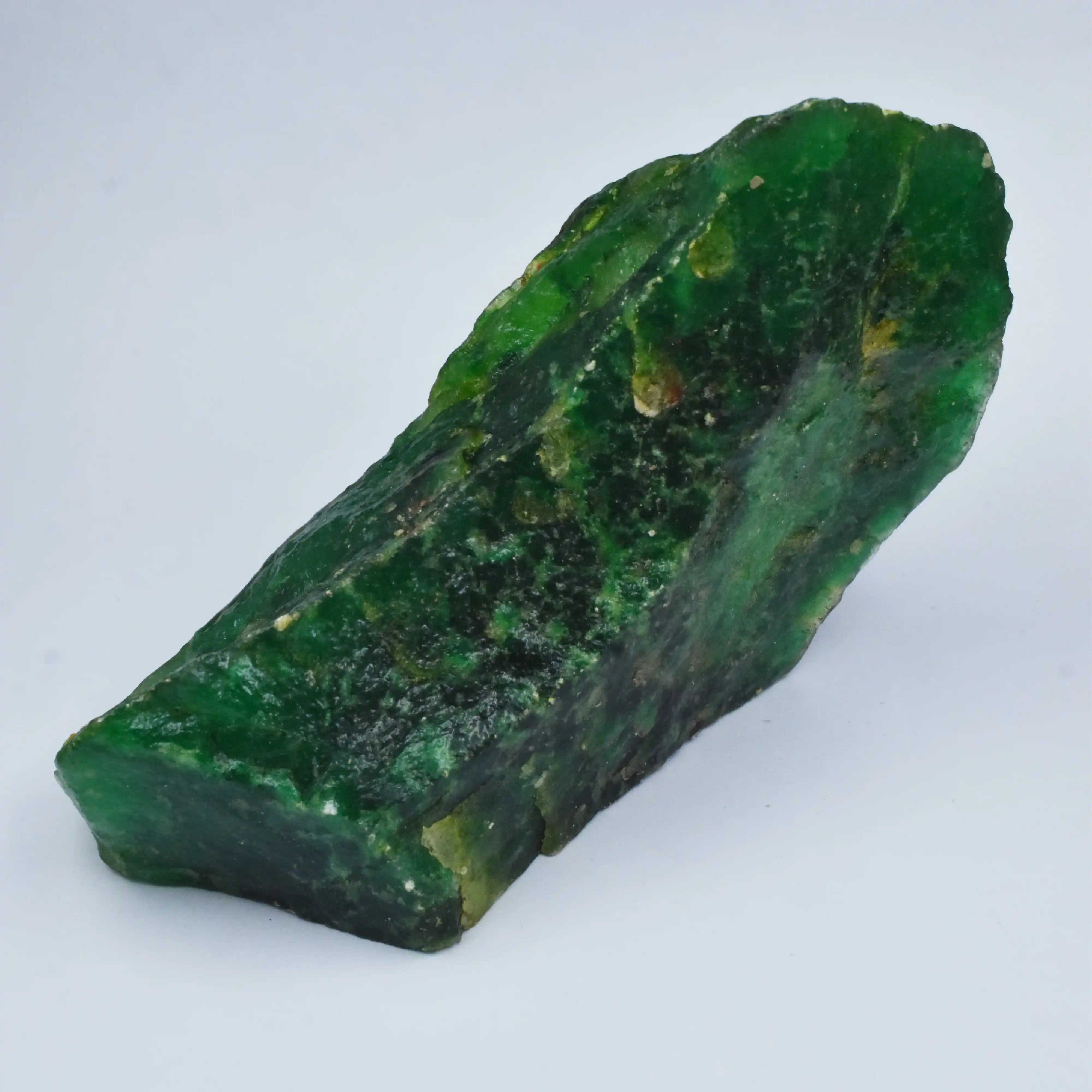 Green mineral rock on a white background