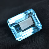 Natural 12.00 Ct Aquamarine Emerald Cut Gem on Black Background