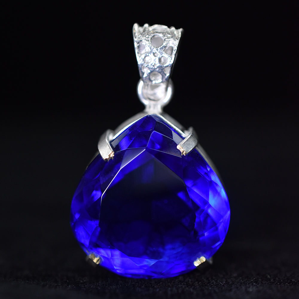 silver topaz pendant India