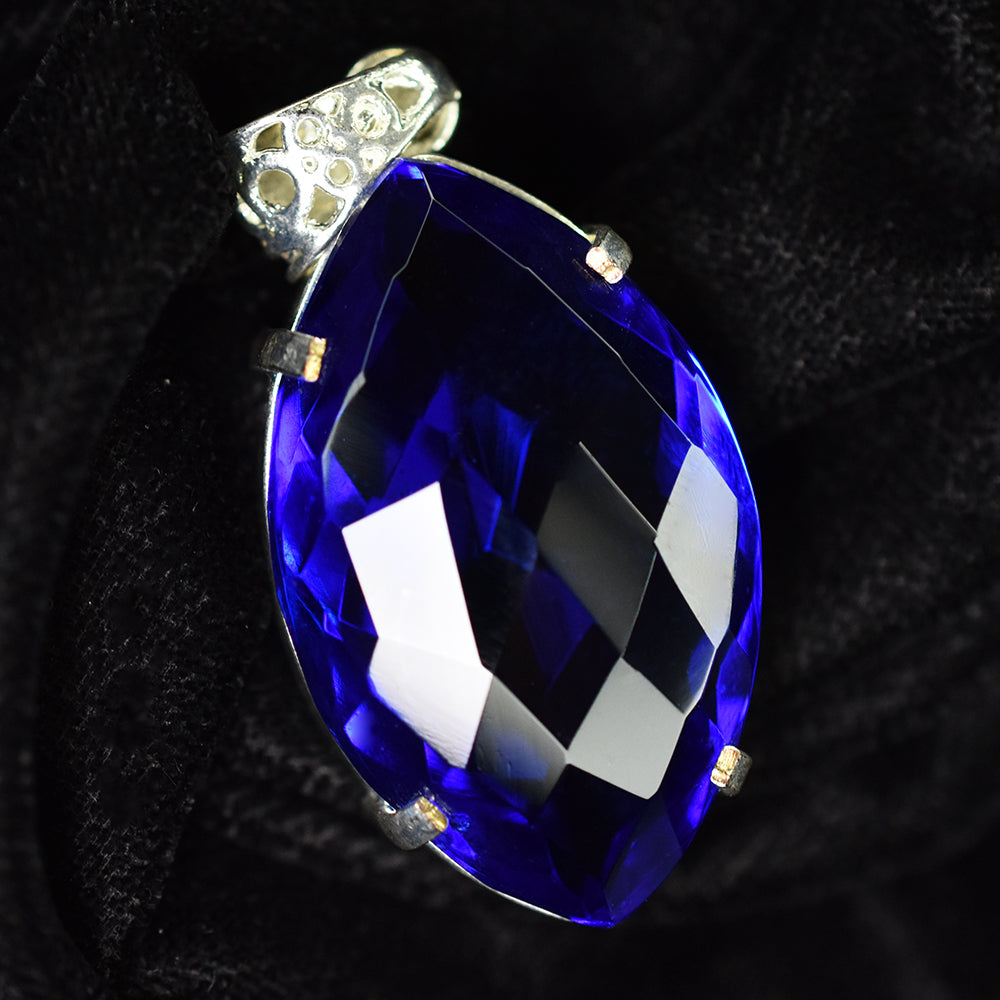 silver topaz pendant India