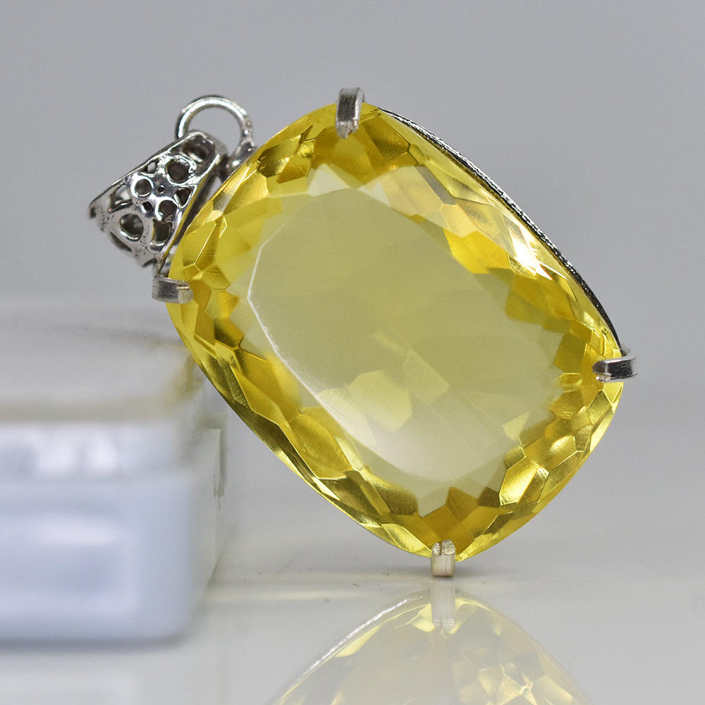 silver topaz pendant India