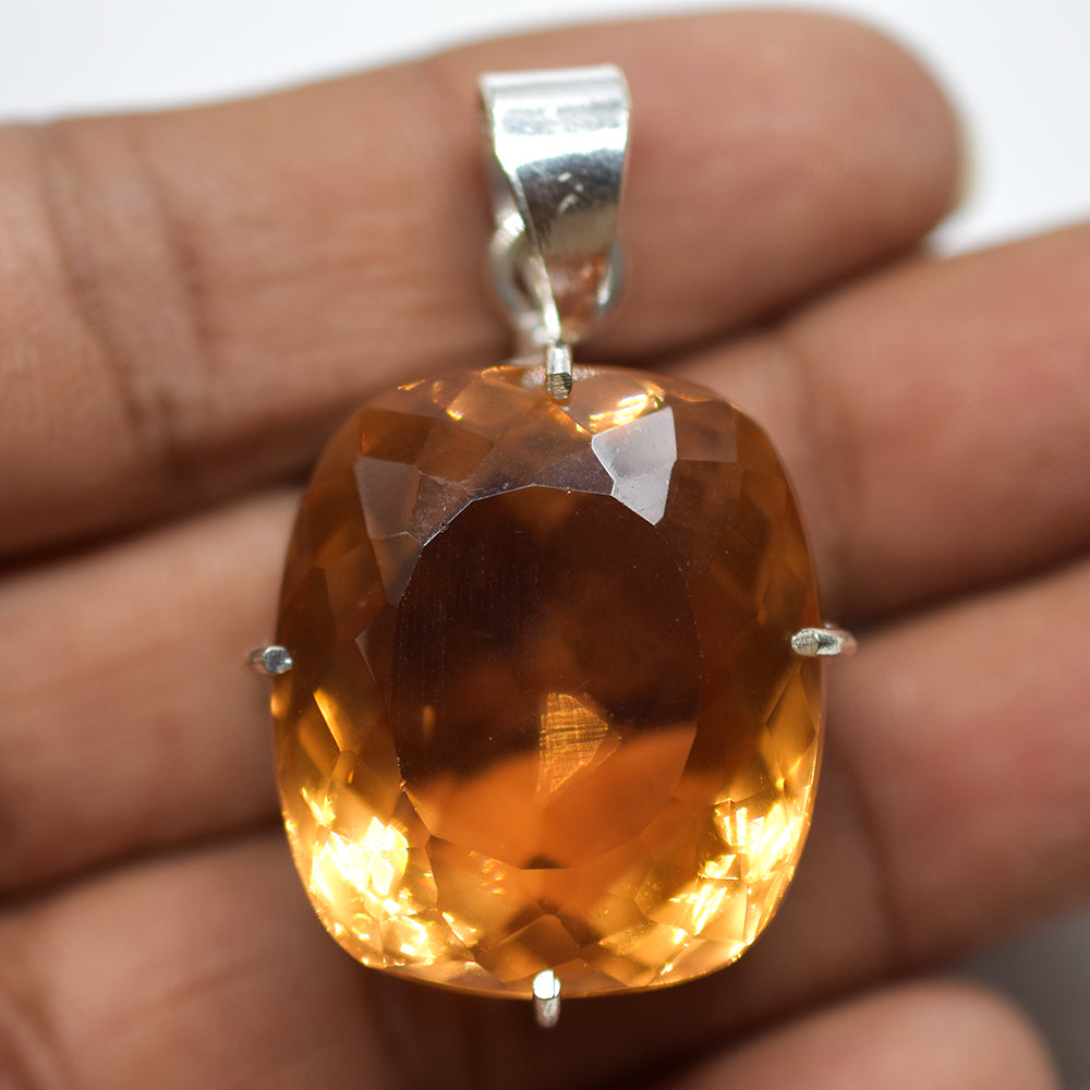 silver topaz pendant India
