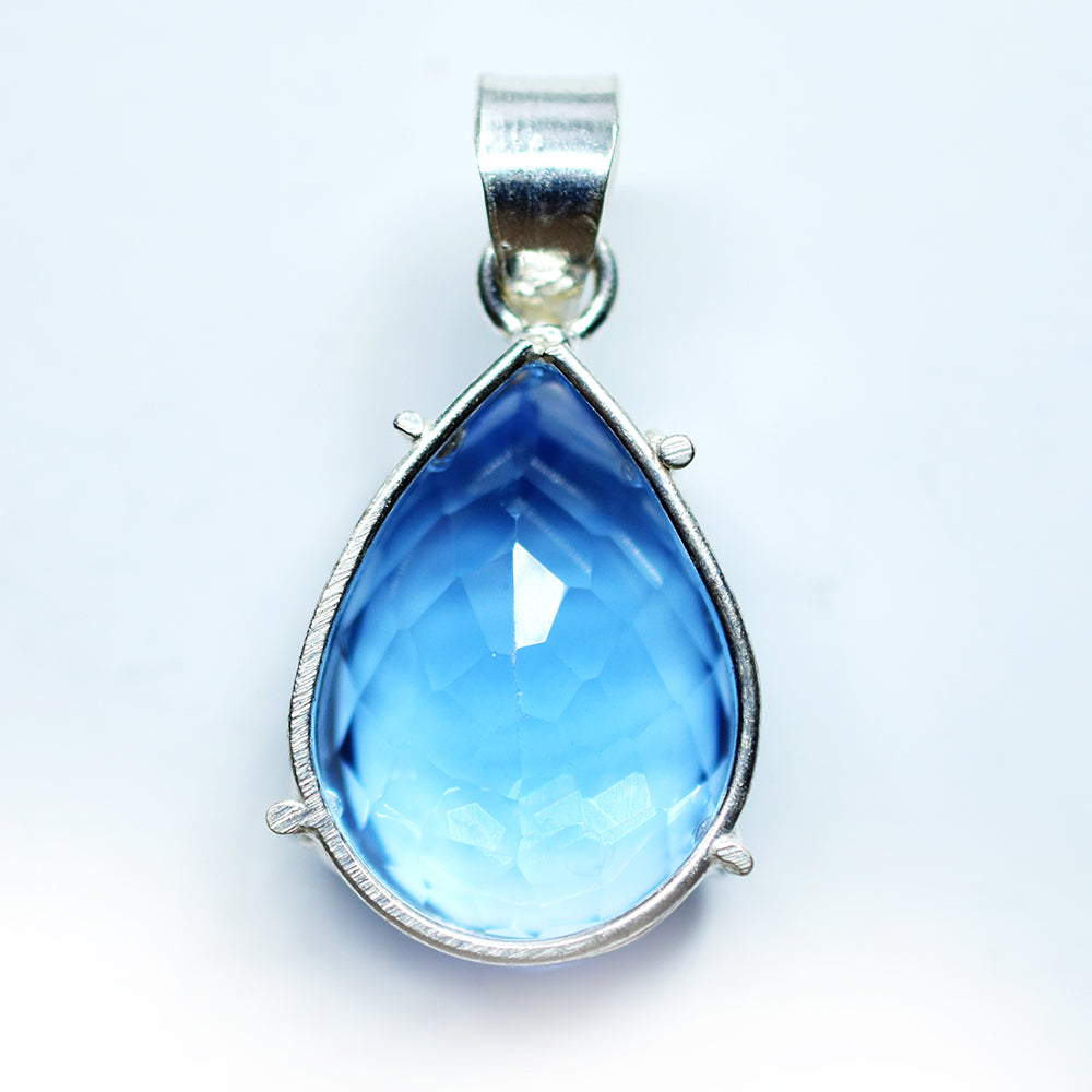 silver topaz pendant India