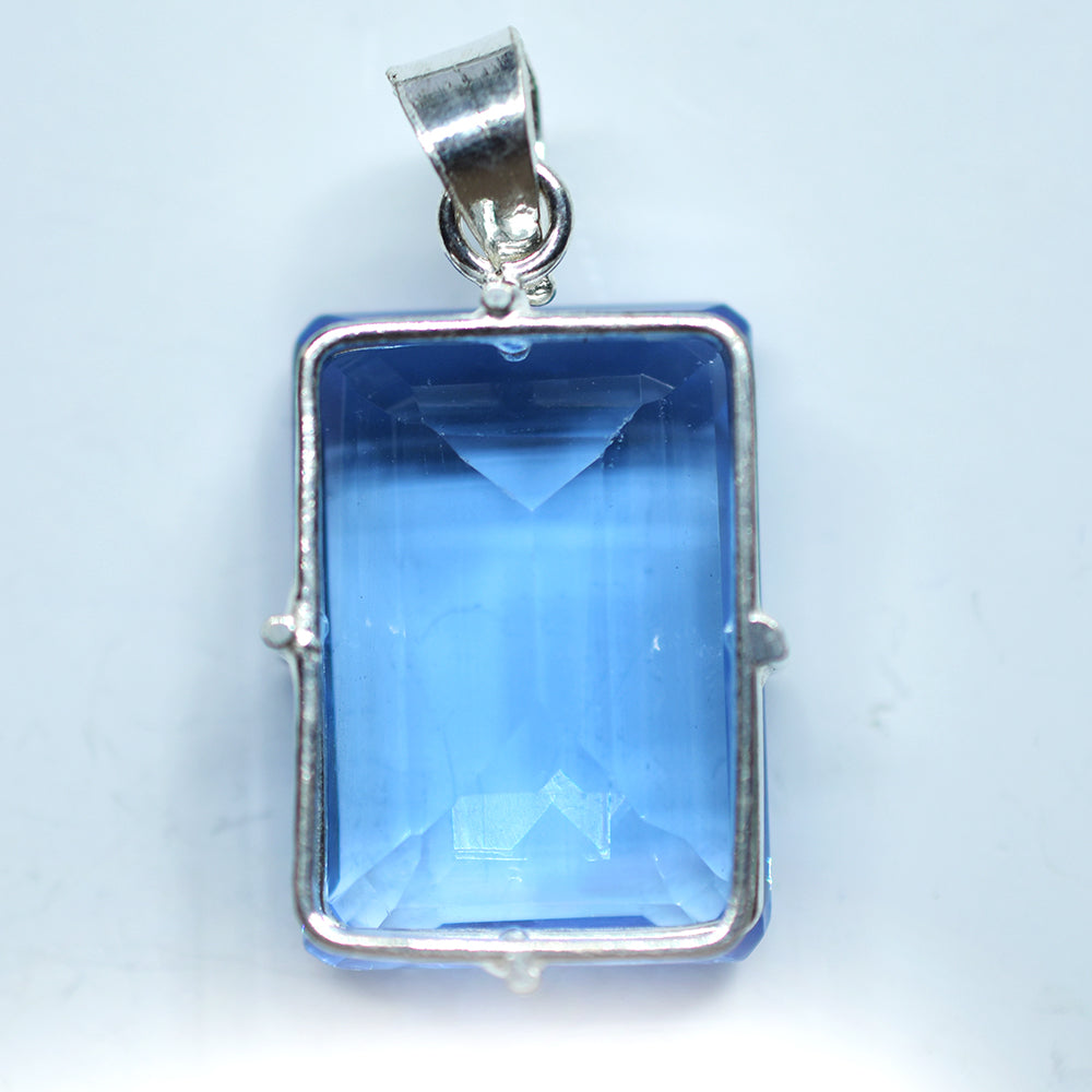 silver topaz pendant India