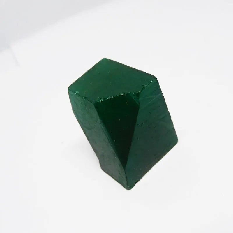 Uncut Colombian Emerald 331.10 Ct gemstone close-up view