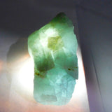 Natural Blue Aquamarine Rough Gemstone - close-up showing natural texture