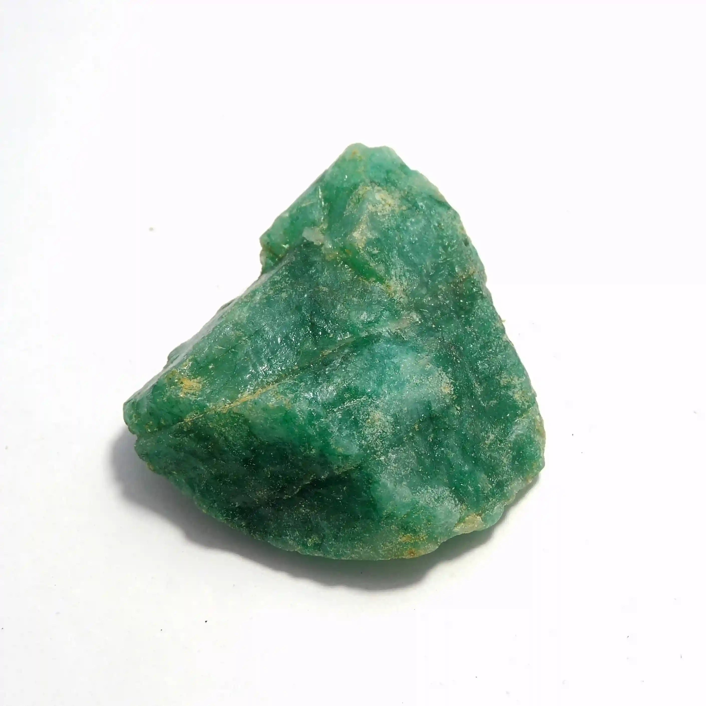 Green mineral stone on a white background