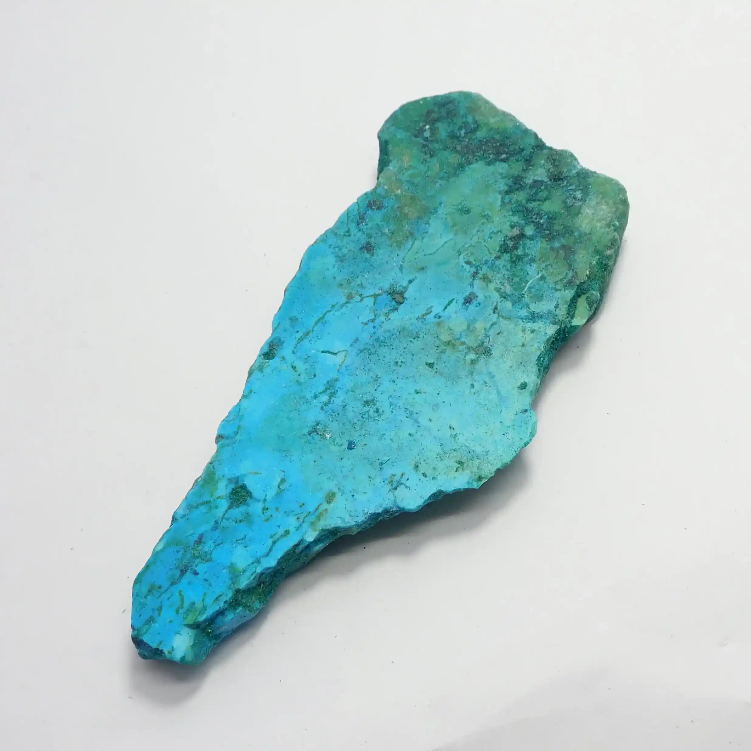 Turquoise stone on a white background