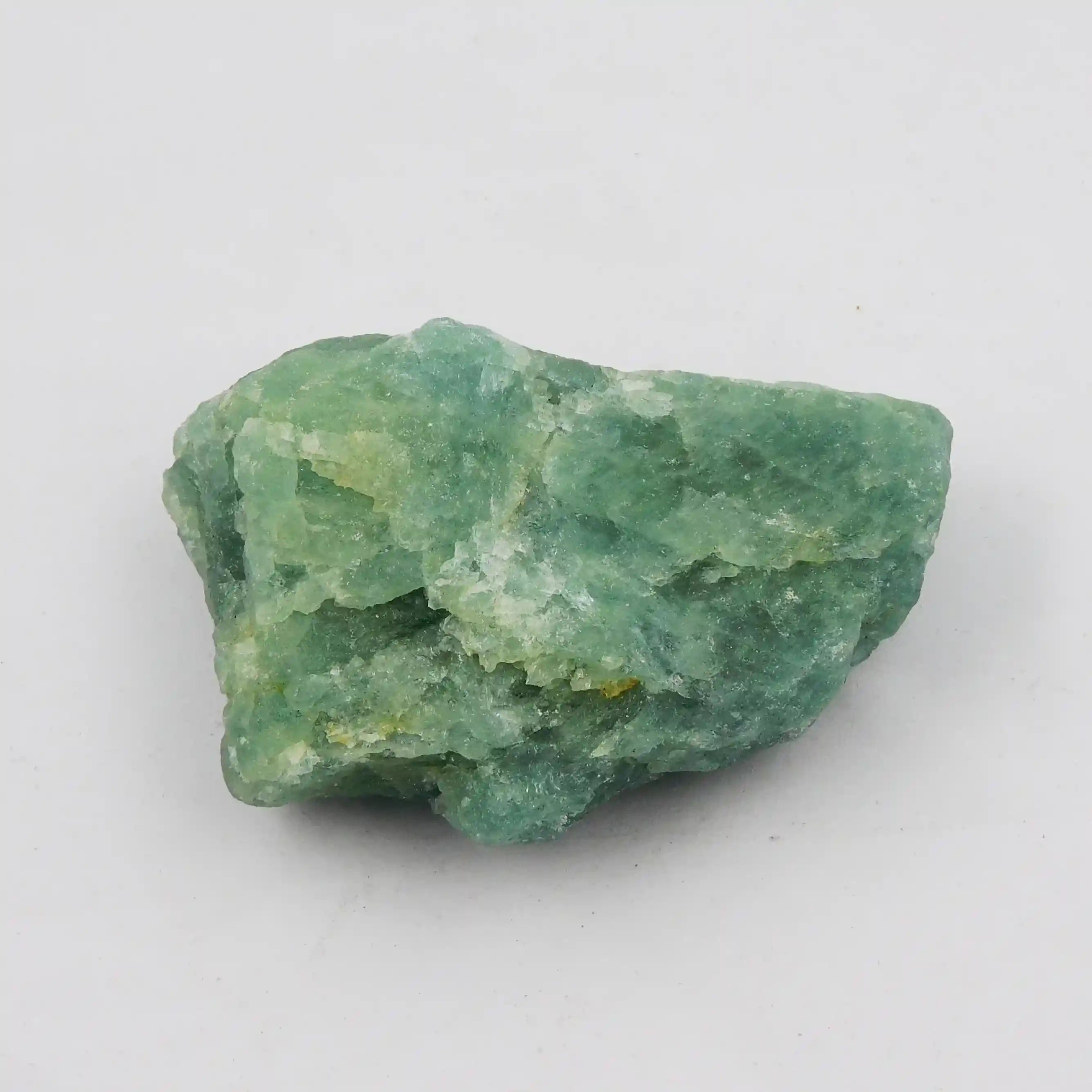 Green mineral rock on a white background