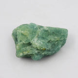 Green mineral rock on a white background