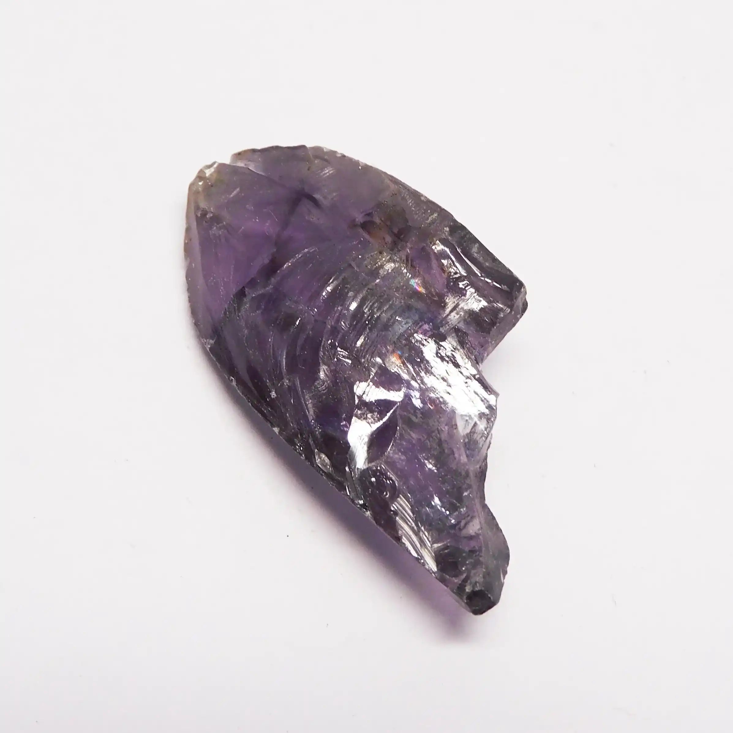 Amethyst crystal on a white background