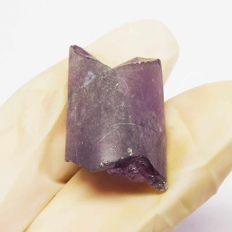Natural Alexandrite Color Change Gemstone under incandescent light