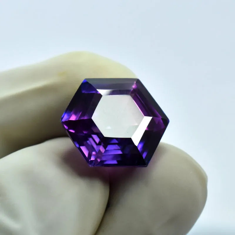 11.84 Ct Purple Sapphire Color Change Gem close-up view