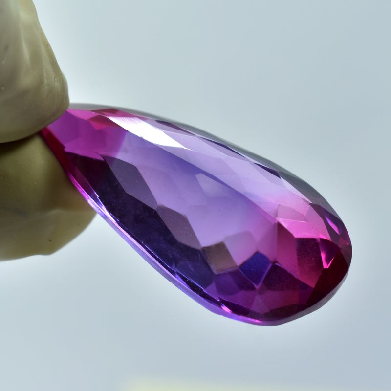 30.60 Ct Bi-Color Sapphire centerpiece stone for engagement ring