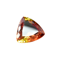 Trillion-cut bi-color sapphire, 15.90 carats, a certified loose gemstone