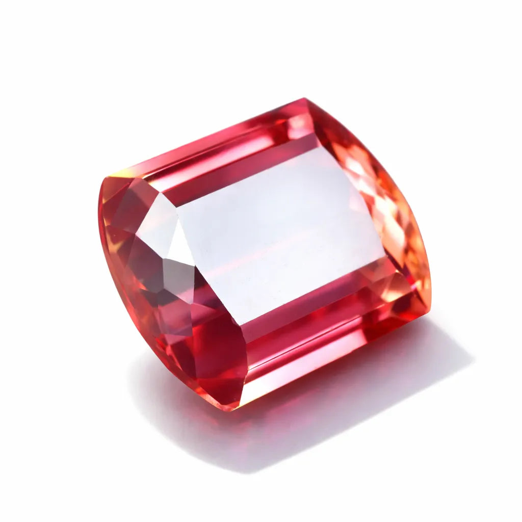Red gemstone on a white background