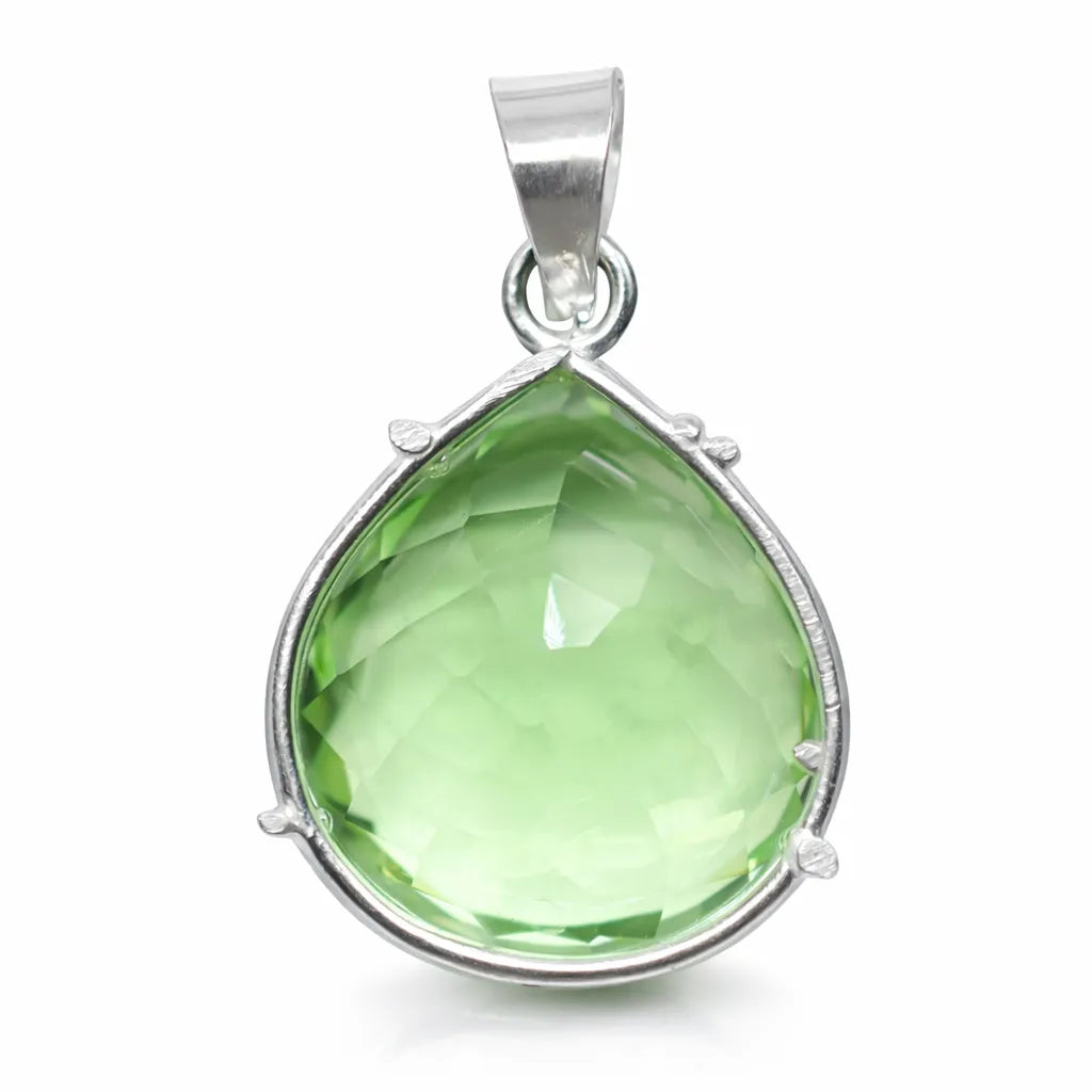Green teardrop pendant with silver frame on a white background