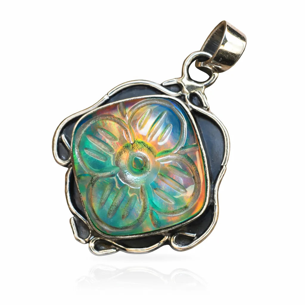 Pendant with a colorful, iridescent design on a white background