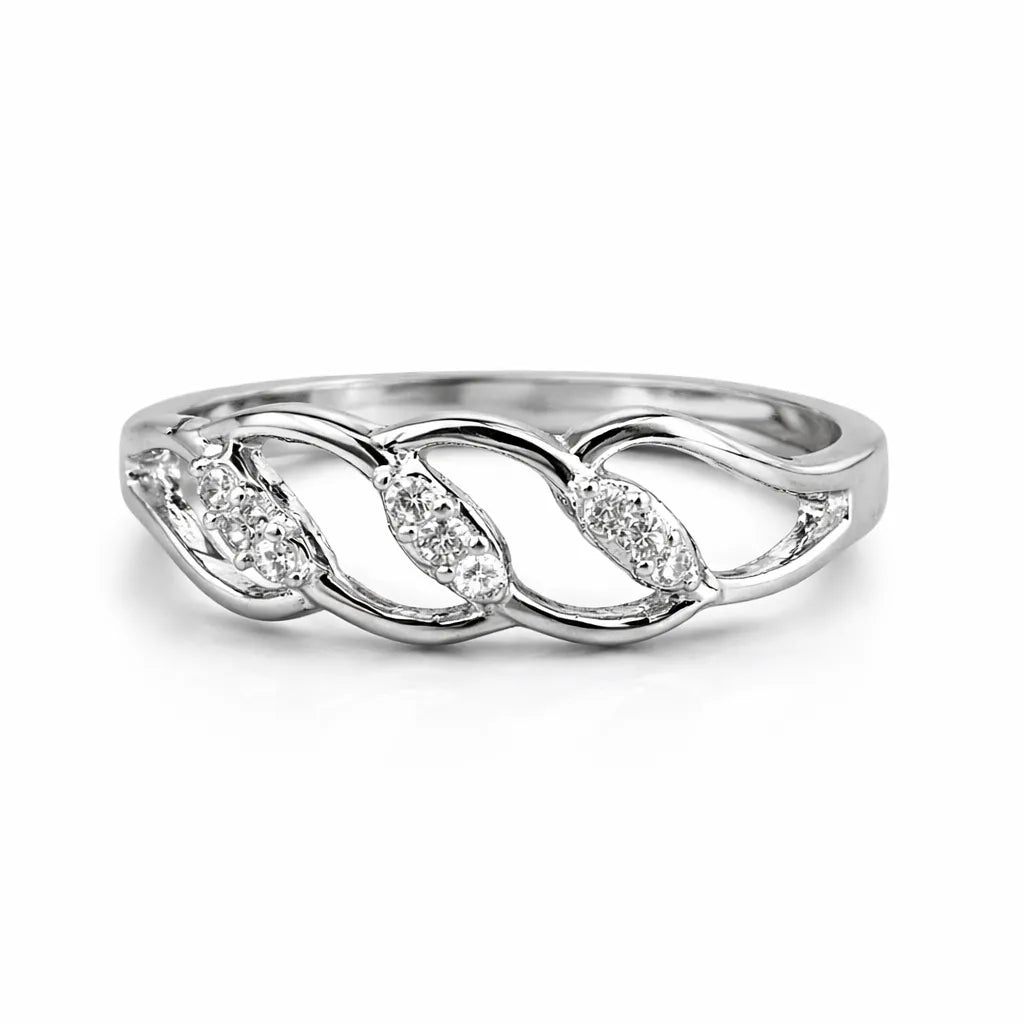 Silver ring with diamond accents on a white background