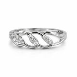 Silver ring with diamond accents on a white background
